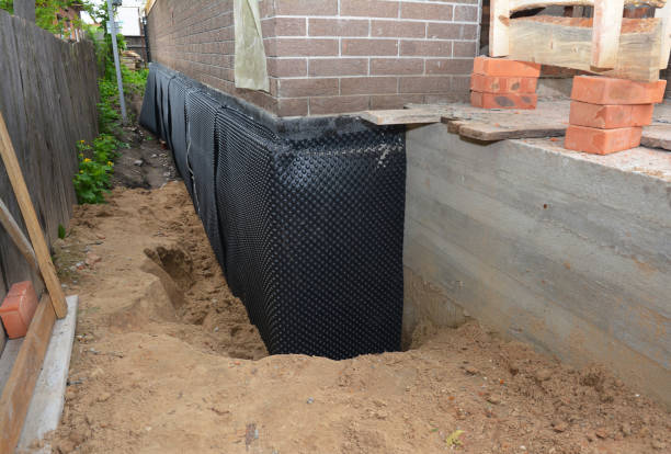 Happy homeowners after waterproofing job in Rolling Meadows
